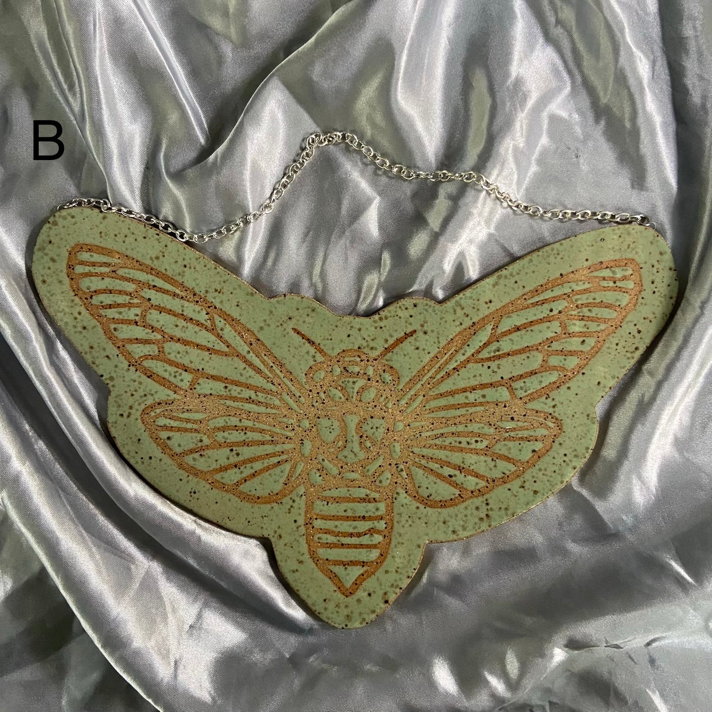Winged Wall Hangers
